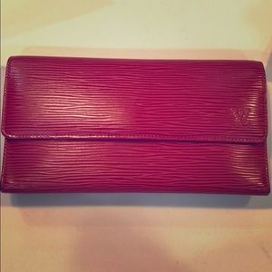 Red EPI leather Louis Vuitton International Wallet